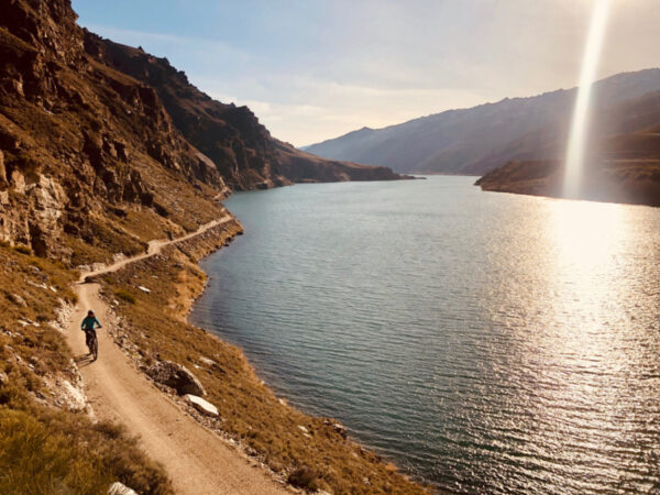 Enjoy Cycling The Dunstan Trail Alongside The Lake.