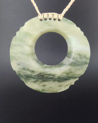 Greenstone disc pendant