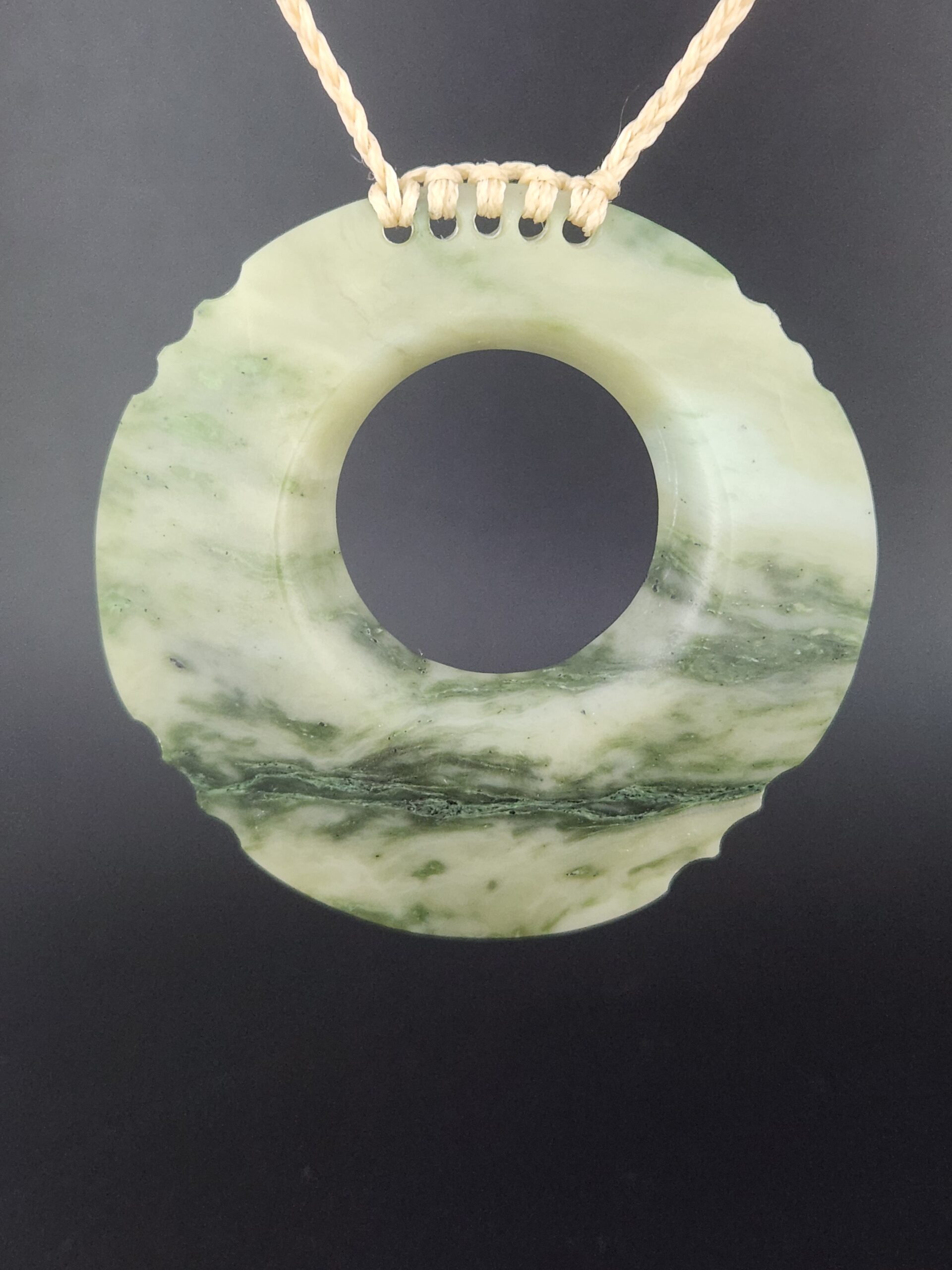 Greenstone disc pendant