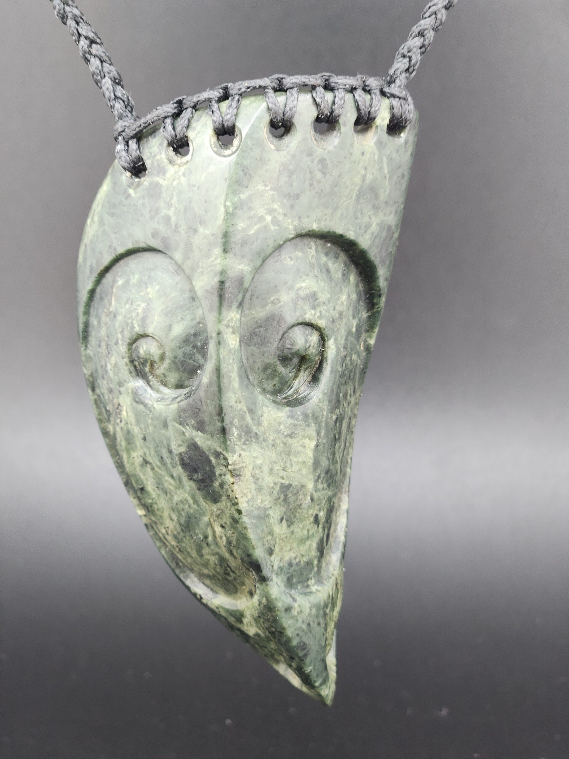 Tooth shape greenstone pendant