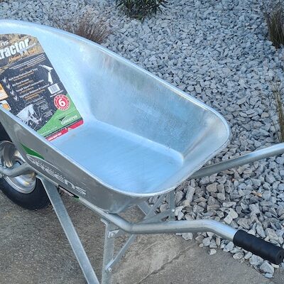 Image of a silver coloured, sturdy wheelbarrow